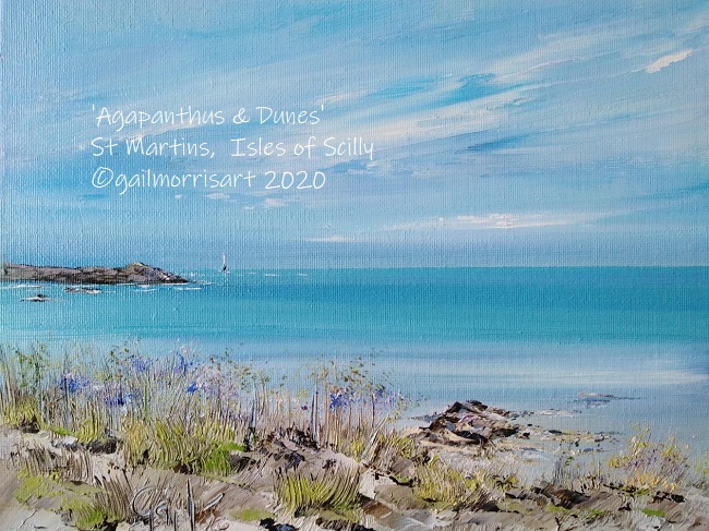'Agapanthus & Dunes' painting depicting a coastal scene in St Martins, Isles of Scilly, featuring blue skies, calm turquoise waters, and sandy dunes with flowering wild blue agapanthus in the foreground.