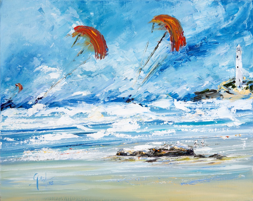 A vibrant painting depicting a beach scene with colorful kitesurfers at Gwithian sands soaring above the ocean, strong white waves, and Godrevy  lighthouse in the background.