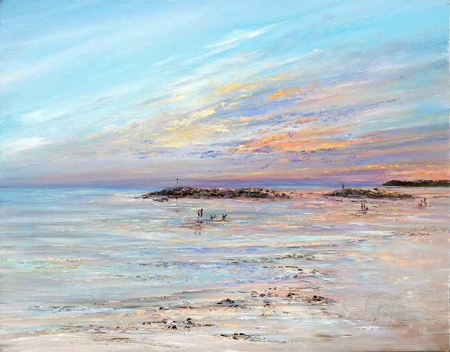 A print depicting a serene Sidmouth beach scene at sunset, with gentle waves lapping at the shore and a colourful sky transitioning from orange to blue. Small figures are seen enjoying the beach in the distance.