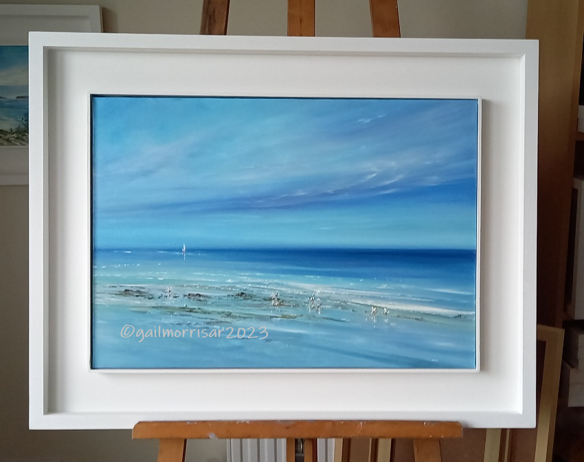 assing Clouds - Teignmouth Beach - Original oil painting with white St Ives frame available to buy £495. This item is  currently exhibited at Cockington Court near Torquay Devon from 29 3.24 to 2.6.24